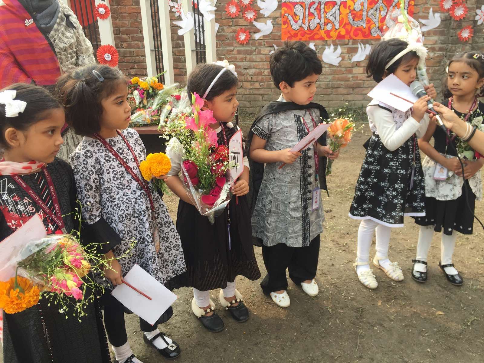 Junior pupils at a Playpen school ceremony