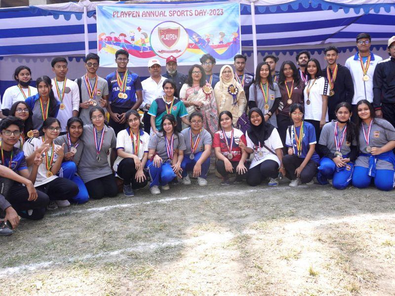 Playpen students in a mass display at Annual Sports